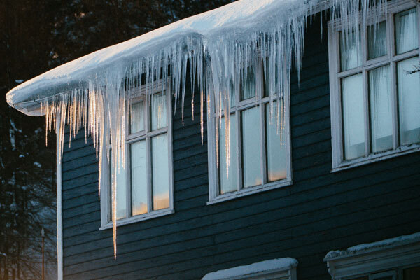 Photo of ice dam removal services for a residential home in South Shore MA